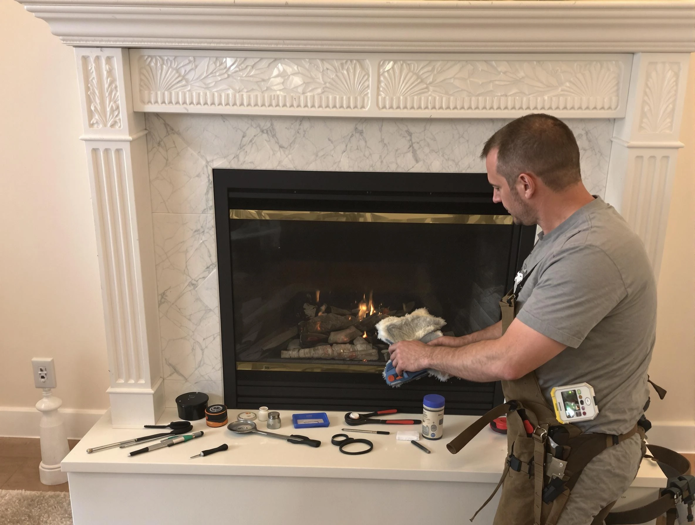 Duluth Chimney Sweep performing fireplace maintenance in Duluth, GA